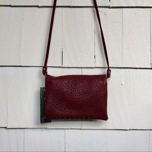 Burgundy Street Level Eyelet Crossbody Clutch